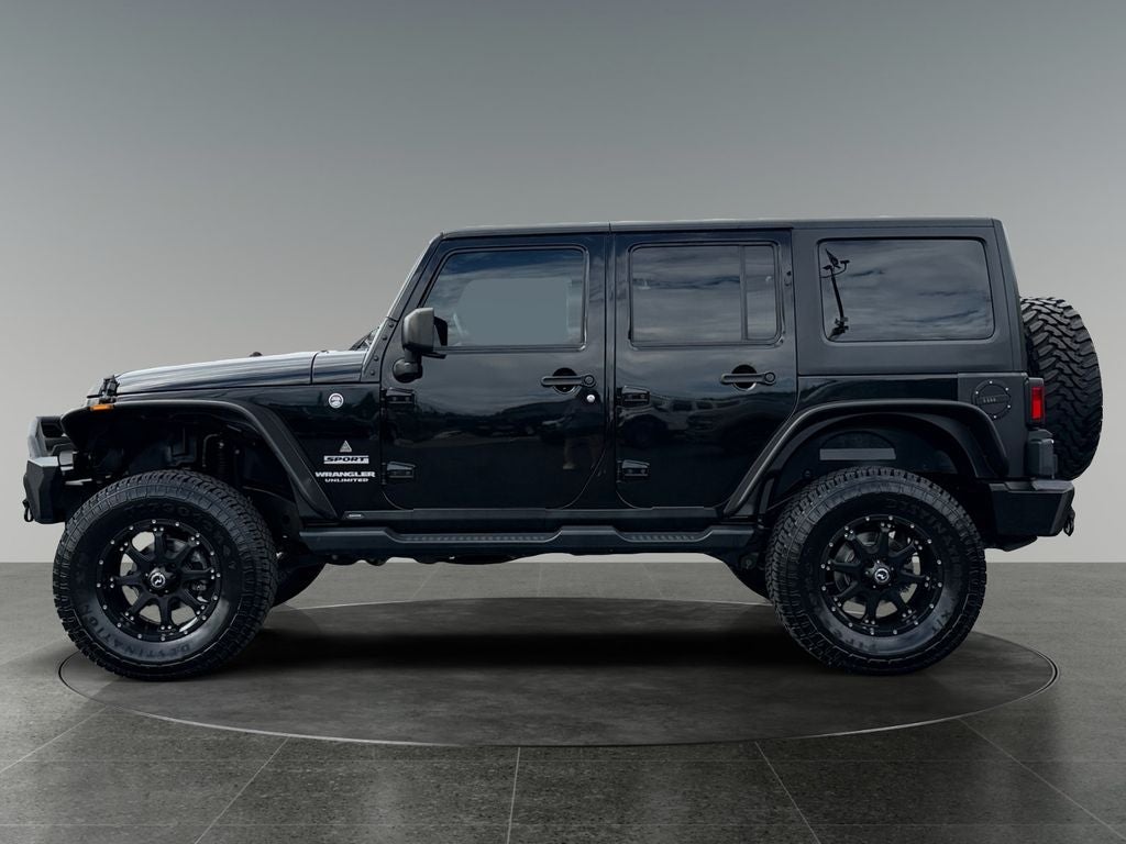 2016 Jeep Wrangler Unlimited Sport *Lifted*